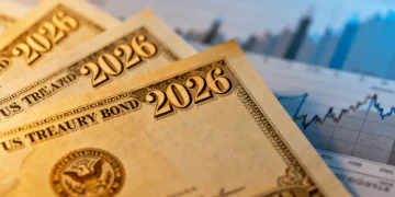 US Treasury bonds certificates with financial charts in background